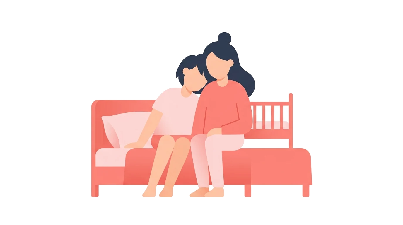 Two partners sitting close on a bed with a crib nearby, illustrating rebuilding intimacy after a birth
